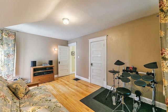1311 Monroe St NE, Minneapolis, MN 55413 - living room featuring wood-type flooring and baseboards