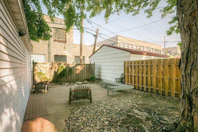 1311 Monroe St NE, Minneapolis, MN 55413 - fenced backyard with a patio area