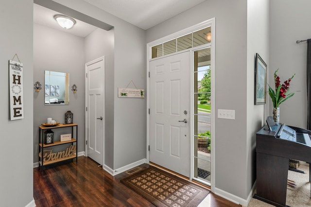 8607 Portage Ln E, Shakopee, MN 55379 - entryway with wood finished floors and baseboards