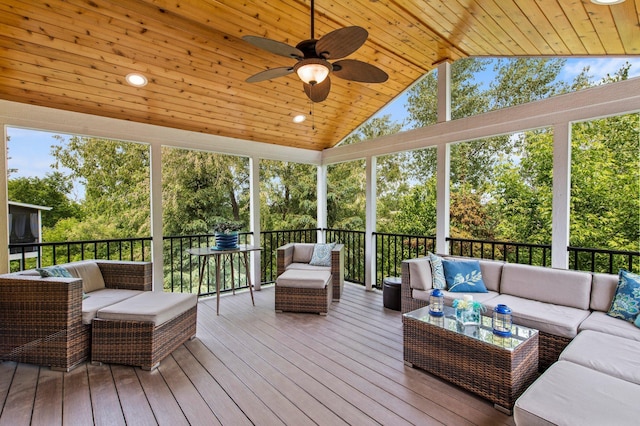 8607 Portage Ln E, Shakopee, MN 55379 - sunroom with outdoor lounge area, lofted ceiling, ceiling fan, and view of scattered trees