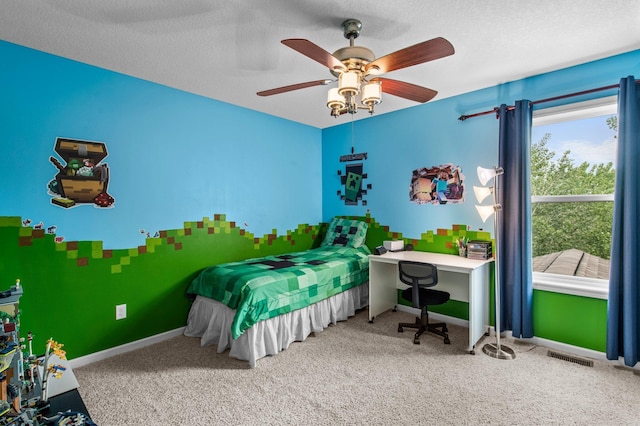 8607 Portage Ln E, Shakopee, MN 55379 - bedroom with carpet floors, baseboards, a ceiling fan, and a textured ceiling