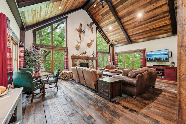 9590 Woodhill Blvd, New Market Twp, MN 55044 - living area with high vaulted ceiling, wood ceiling with exposed beams, dark wood-type flooring, a stone fireplace, and healthy amount of natural light