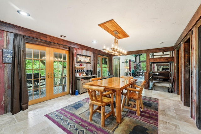 9590 Woodhill Blvd, New Market Twp, MN 55044 - dining area with french doors, healthy amount of natural light, light stone finish floors, and recessed lighting