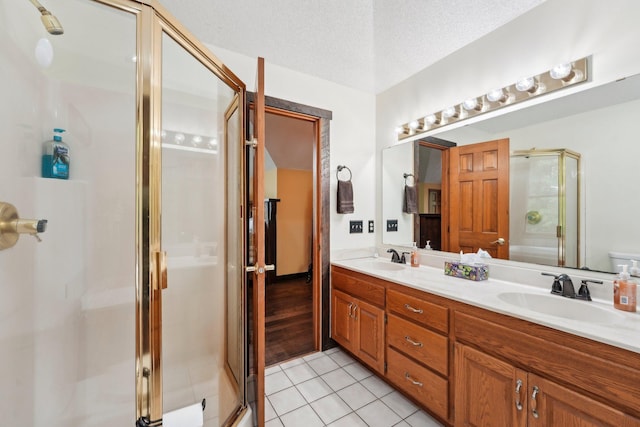 9590 Woodhill Blvd, New Market Twp, MN 55044 - bathroom with a stall shower, double vanity, and tile patterned flooring