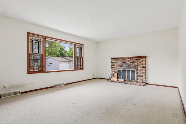 5421 Church Rd, Mound, MN 55364 - unfurnished living room featuring carpet, baseboards, and a brick fireplace