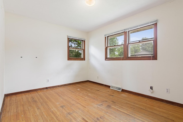 5421 Church Rd, Mound, MN 55364 - unfurnished room with light wood-style flooring and baseboards