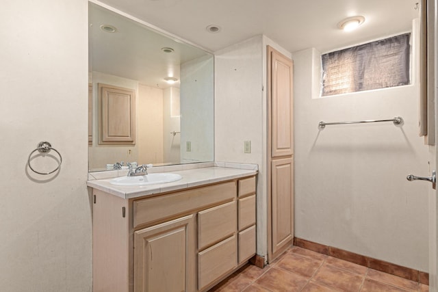 5421 Church Rd, Mound, MN 55364 - bathroom featuring vanity, tile patterned floors, and baseboards