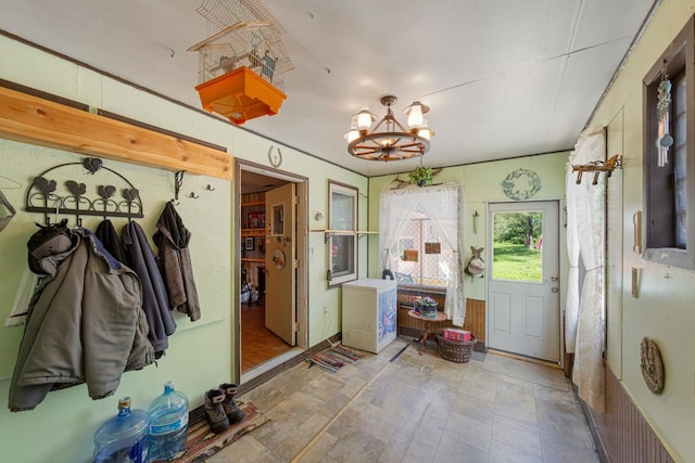 1034 8th St NW, Faribault, MN 55021 - mudroom with a chandelier and stone finish floors