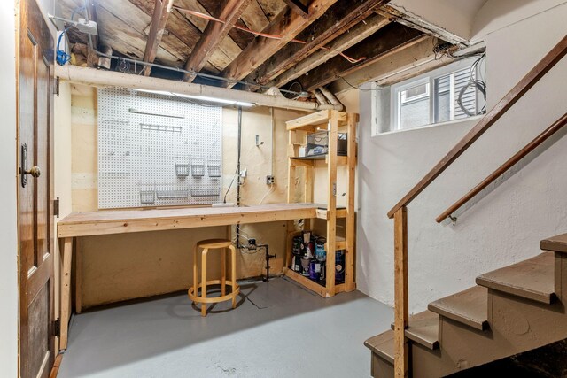 2441 Grand Ave S, Minneapolis, MN 55405 - below grade area with a workshop area and stairway