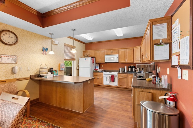 1880 3rd Ave NW Unit 202, Rochester, MN 55901 - kitchen featuring white appliances, ornamental molding, a peninsula, wood finished floors, and dark countertops