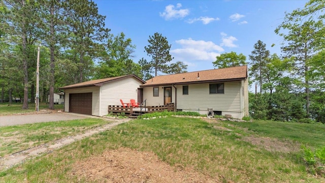 13956 Hardy Lake Rd SW, Pillager, MN 56473 - rear view of house with an outbuilding, a garage, a yard, and a deck