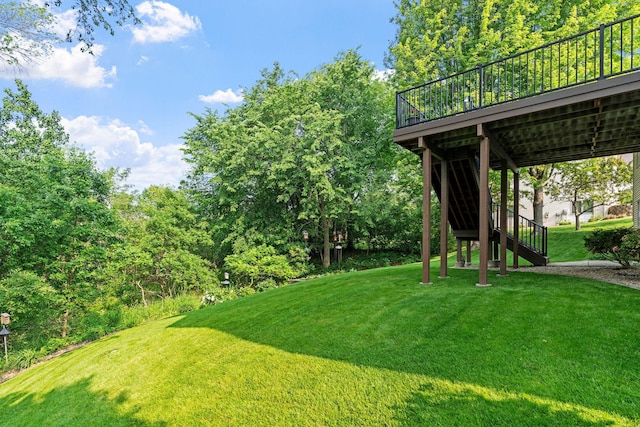 6617 Orchid Ln N, Maple Grove, MN 55311 - view of green lawn with stairway and a wooden deck