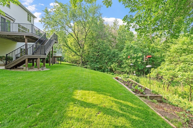 6617 Orchid Ln N, Maple Grove, MN 55311 - view of grassy yard featuring stairs and a wooden deck