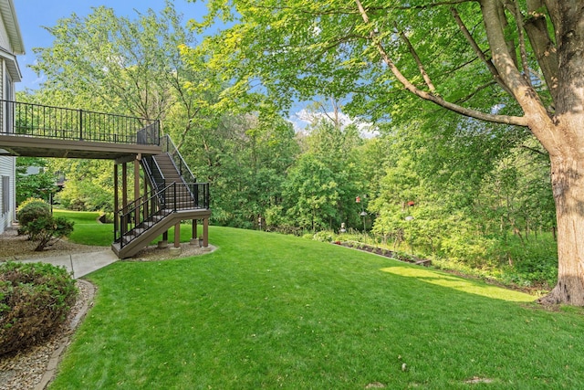 6617 Orchid Ln N, Maple Grove, MN 55311 - view of green lawn with stairs and a wooden deck