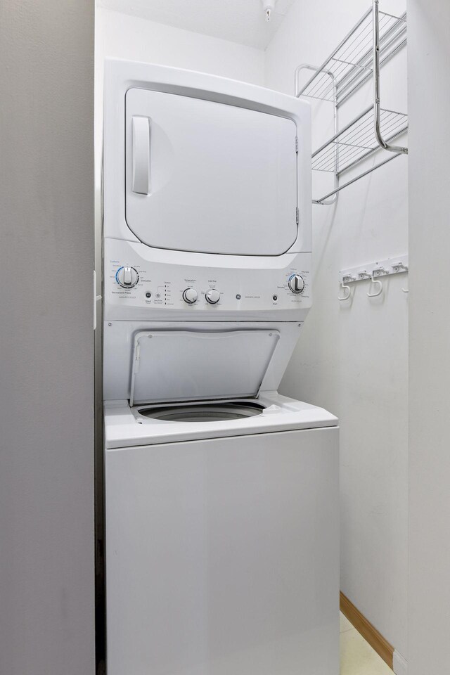 560 2nd St Unit 302, Minneapolis, MN 55401 - washroom with stacked washer / dryer