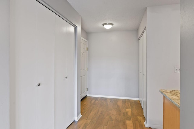 560 2nd St Unit 302, Minneapolis, MN 55401 - corridor with wood finished floors and baseboards