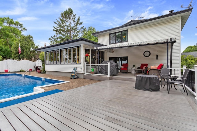 4910 Upper 148th Ct, Apple Valley, MN 55124 - rear view of property featuring a deck and a sunroom
