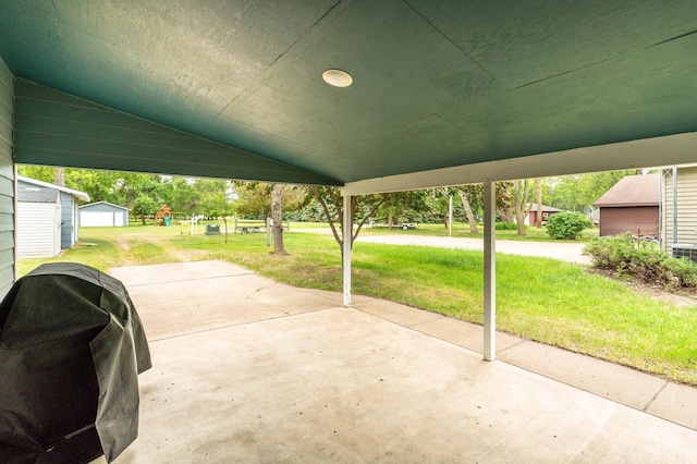 27326 Cloverleaf Ln, Everts Twp, MN 56515 - view of patio with area for grilling and an outdoor structure