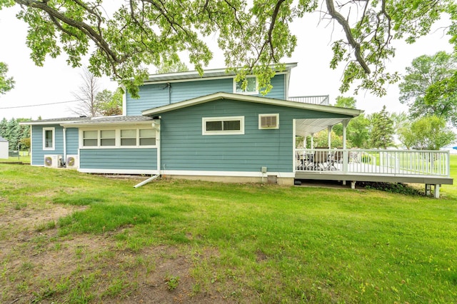 27326 Cloverleaf Ln, Everts Twp, MN 56515 - rear view of house with a deck and a lawn