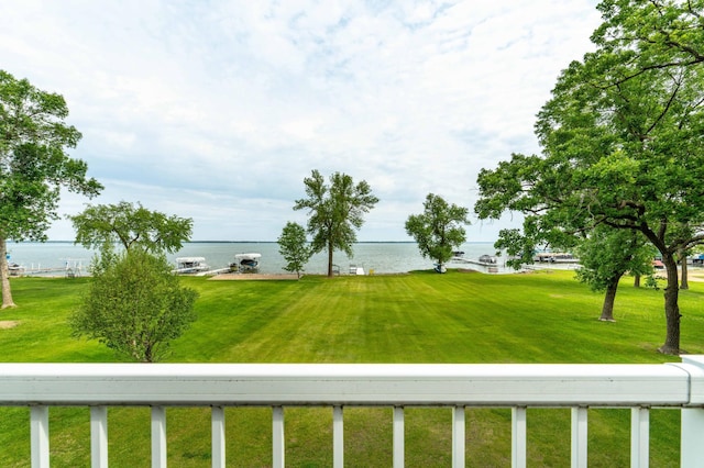 27326 Cloverleaf Ln, Everts Twp, MN 56515 - view of grassy yard featuring a water view and a balcony