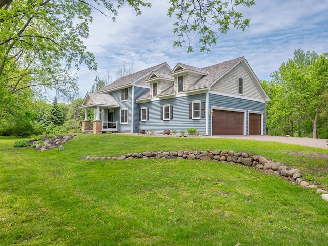7010 Oak Ridge Rd, Corcoran, MN 55340 - view of front of property featuring a front lawn, a garage, and dirt driveway