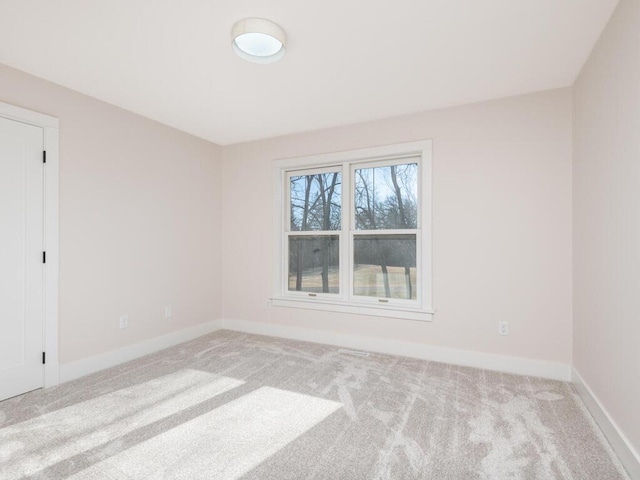 7010 Oak Ridge Rd, Corcoran, MN 55340 - carpeted spare room featuring baseboards