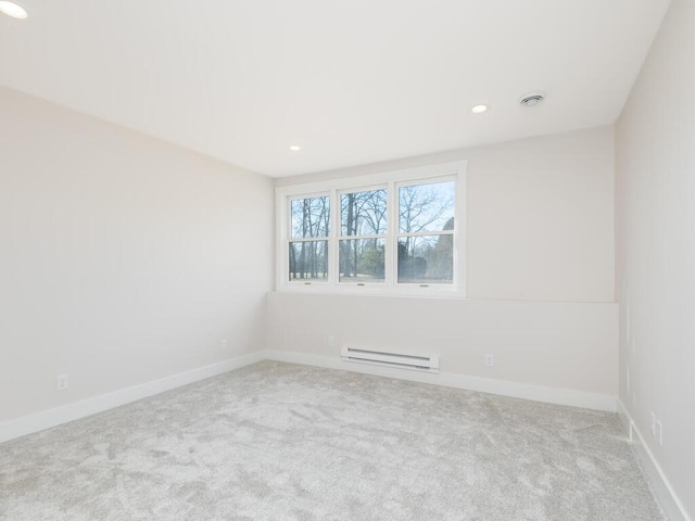 7010 Oak Ridge Rd, Corcoran, MN 55340 - spare room with baseboard heating, carpet floors, recessed lighting, and baseboards