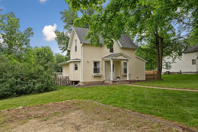 310 Belle St W, Cannon Falls, MN 55009 - view of front of property featuring a shingled roof