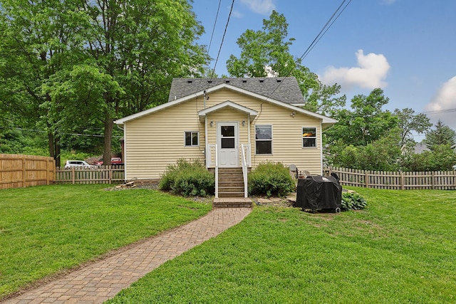 310 Belle St W, Cannon Falls, MN 55009 - rear view of property with a shingled roof