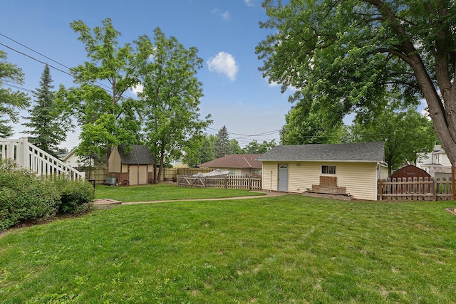 310 Belle St W, Cannon Falls, MN 55009 - fenced backyard featuring a shed