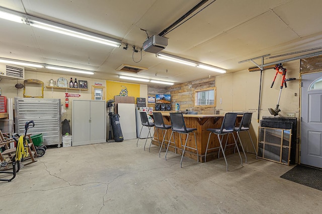 310 Belle St W, Cannon Falls, MN 55009 - garage featuring a garage door opener
