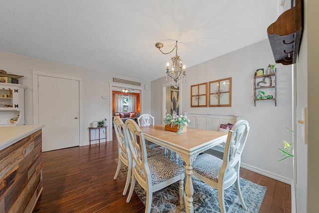 310 Belle St W, Cannon Falls, MN 55009 - dining space featuring dark wood finished floors and a chandelier