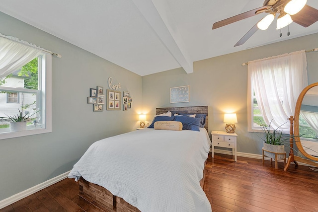 310 Belle St W, Cannon Falls, MN 55009 - bedroom with hardwood / wood-style floors, beam ceiling, and a ceiling fan