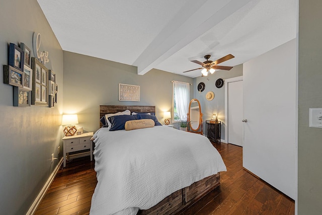 310 Belle St W, Cannon Falls, MN 55009 - bedroom featuring dark wood finished floors, beamed ceiling, and a ceiling fan
