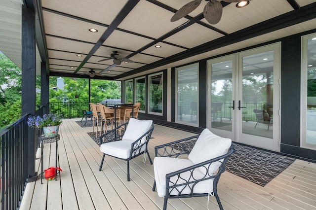 7447 213th St N, Forest Lake, MN 55025 - deck featuring a ceiling fan, french doors, and outdoor dining area