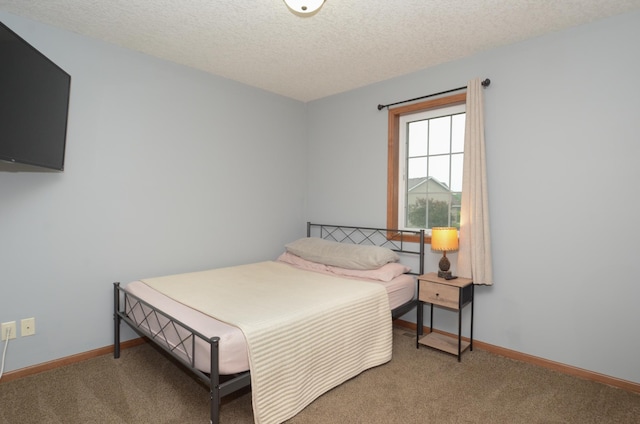1046 Roosevelt St S, Cambridge, MN 55008 - bedroom featuring carpet flooring and a textured ceiling