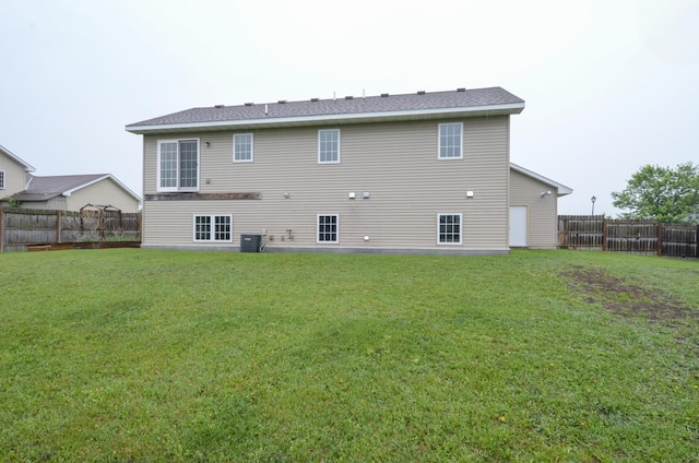 1046 Roosevelt St S, Cambridge, MN 55008 - back of house with a fenced backyard