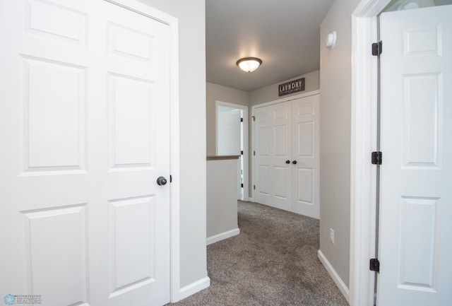 7364 27th St S, Fargo, ND 58104 - corridor with dark carpet and baseboards
