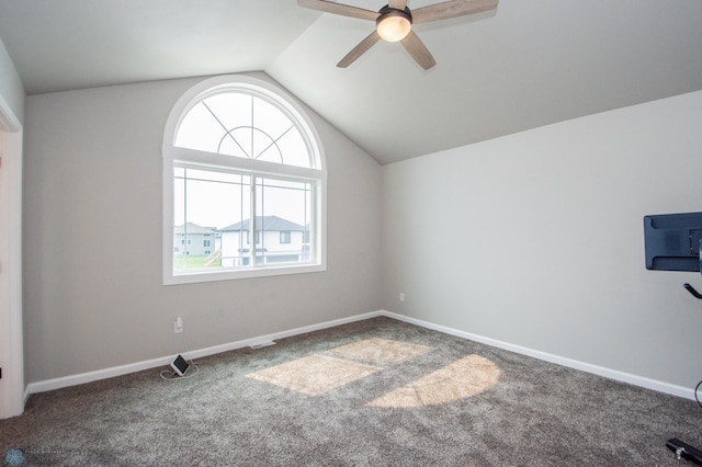 7364 27th St S, Fargo, ND 58104 - bonus room with plenty of natural light, carpet, ceiling fan, vaulted ceiling, and baseboards