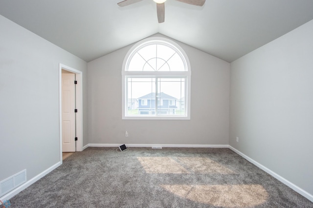 7364 27th St S, Fargo, ND 58104 - unfurnished room with carpet, a ceiling fan, vaulted ceiling, and baseboards