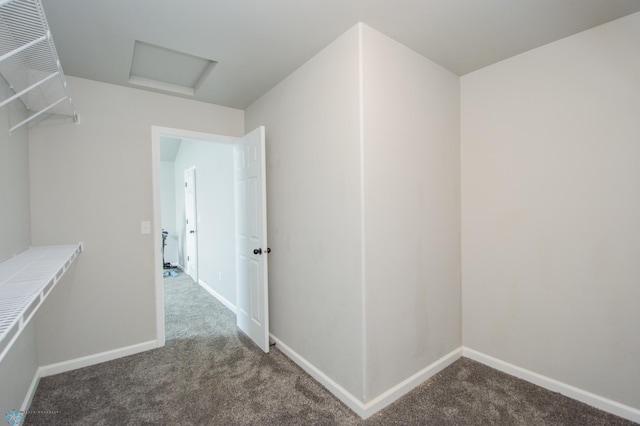 7364 27th St S, Fargo, ND 58104 - spacious closet featuring dark carpet and attic access