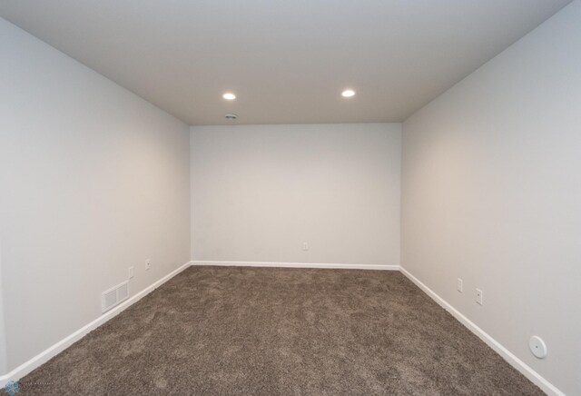 7364 27th St S, Fargo, ND 58104 - empty room with dark carpet, recessed lighting, and baseboards