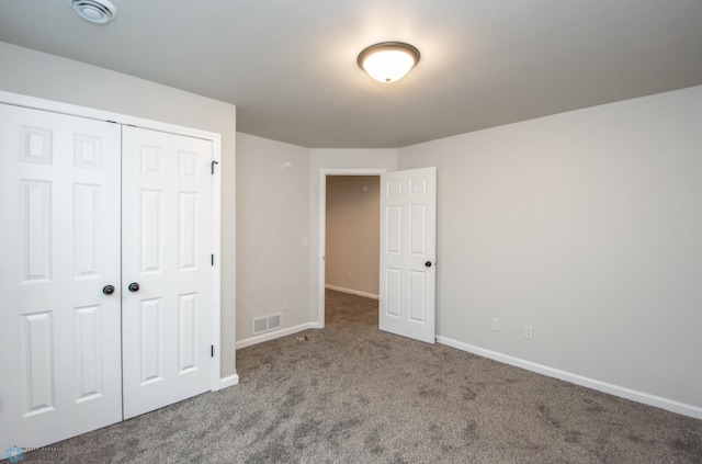 7364 27th St S, Fargo, ND 58104 - unfurnished bedroom with carpet flooring, a closet, and baseboards