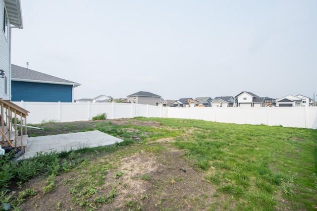 7364 27th St S, Fargo, ND 58104 - view of yard featuring a patio and a residential view
