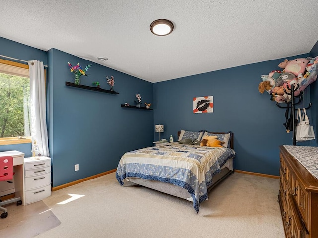 1875 26th Ave NW, New Brighton, MN 55112 - carpeted bedroom with a textured ceiling and baseboards