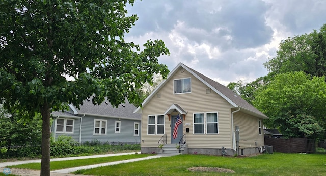 1442 11th Ave S, Fargo, ND 58103 - view of front of property with entry steps and cooling unit