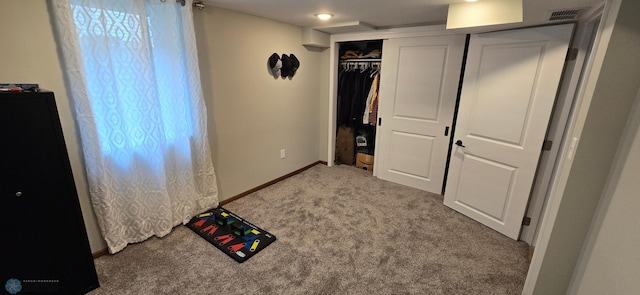 1442 11th Ave S, Fargo, ND 58103 - carpeted bedroom with baseboards and a closet