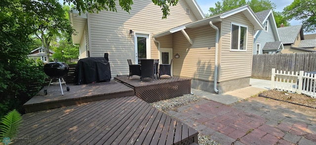 1442 11th Ave S, Fargo, ND 58103 - back of property featuring a deck and a patio area