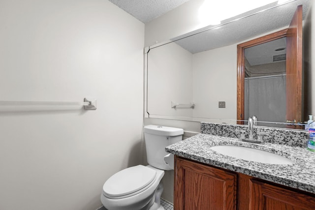 3625 Gettysburg Ave S Unit 40, Saint Louis Park, MN 55426 - bathroom with toilet, vanity, and a textured ceiling