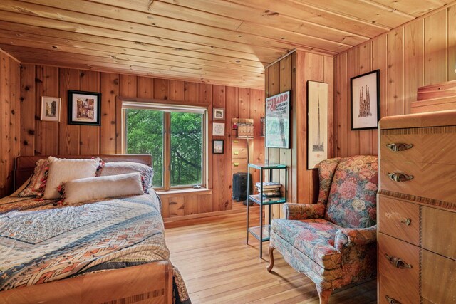 8482 150th St E, Northfield Twp, MN 55057 - bedroom featuring wooden ceiling, wooden walls, and light wood finished floors